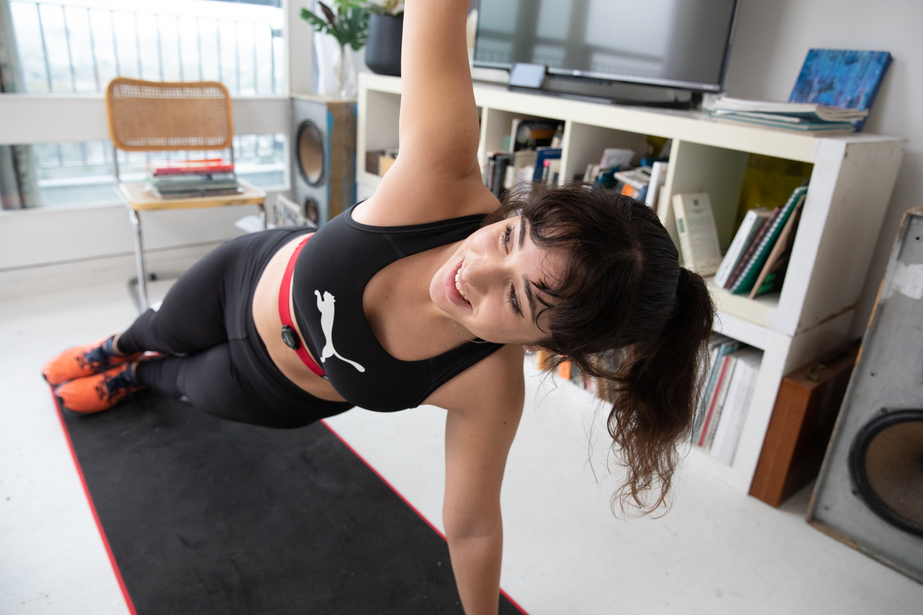 Person in yoga pose while wearing MyZone belt