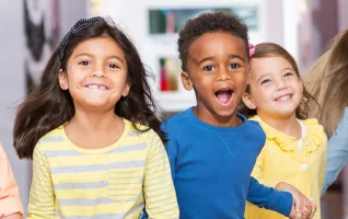 Happy kids in a hall