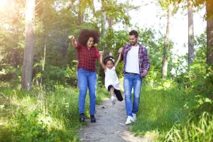 A family takes a walk outside