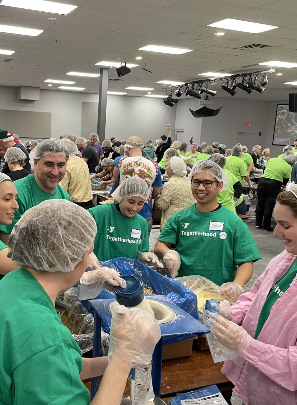 volunteers packing food