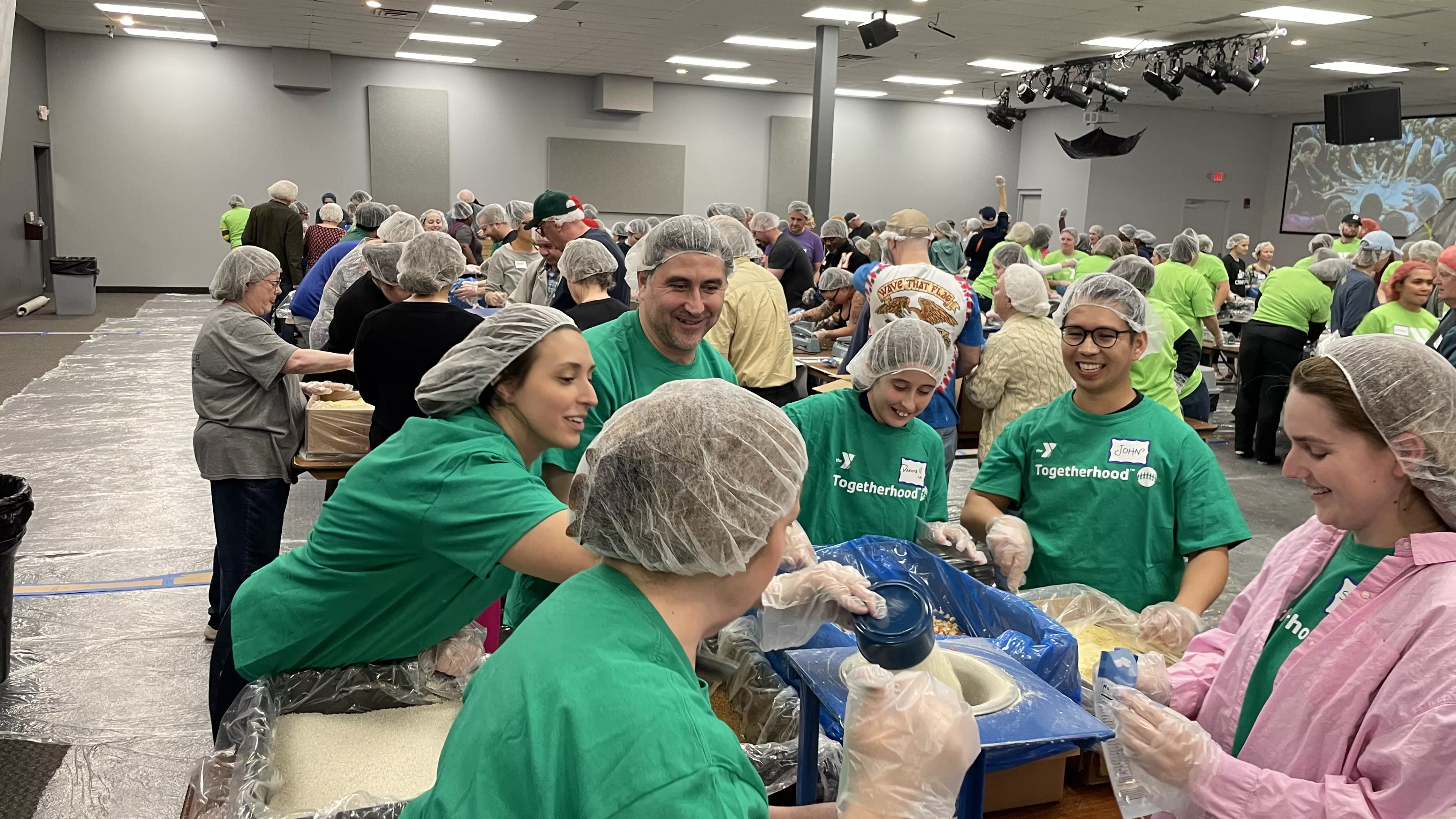 volunteers packing food
