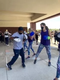 Omar Teaches a Boxing Class Outdoors