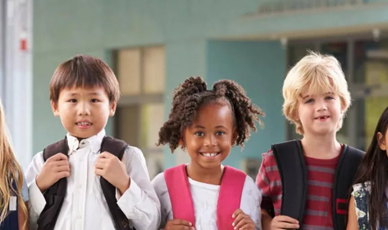 Children wearing backpacks