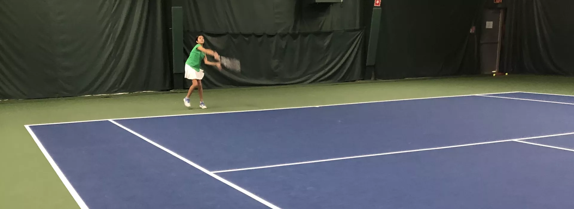 Tennis player serving the ball