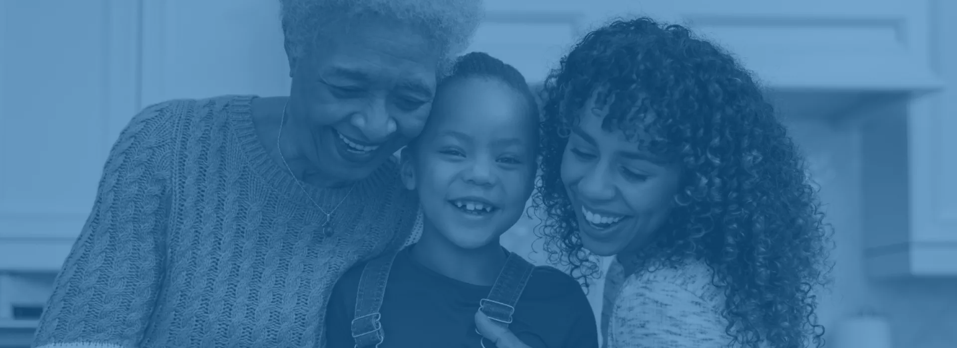 multiple generations of family members smiling
